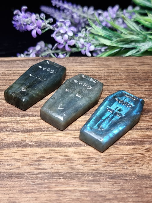 Labradorite coffin carvings