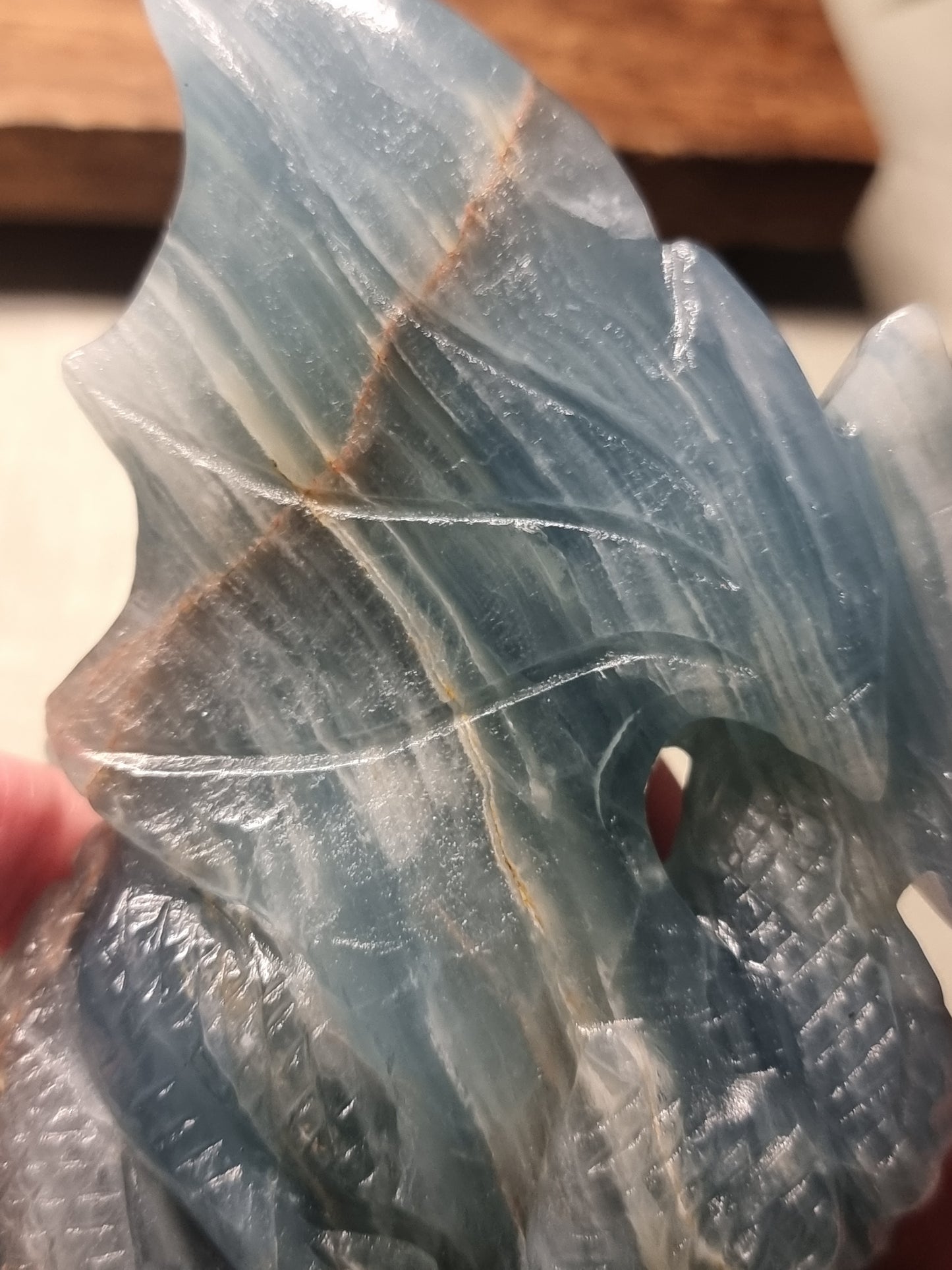 Hand carved blue aquatine calcite dragon