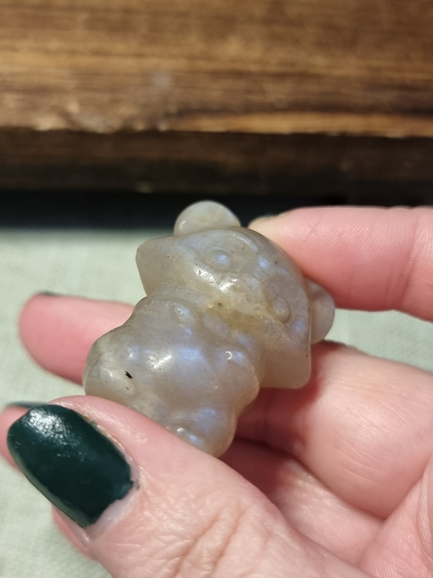 Moonstone raccoon carvings
