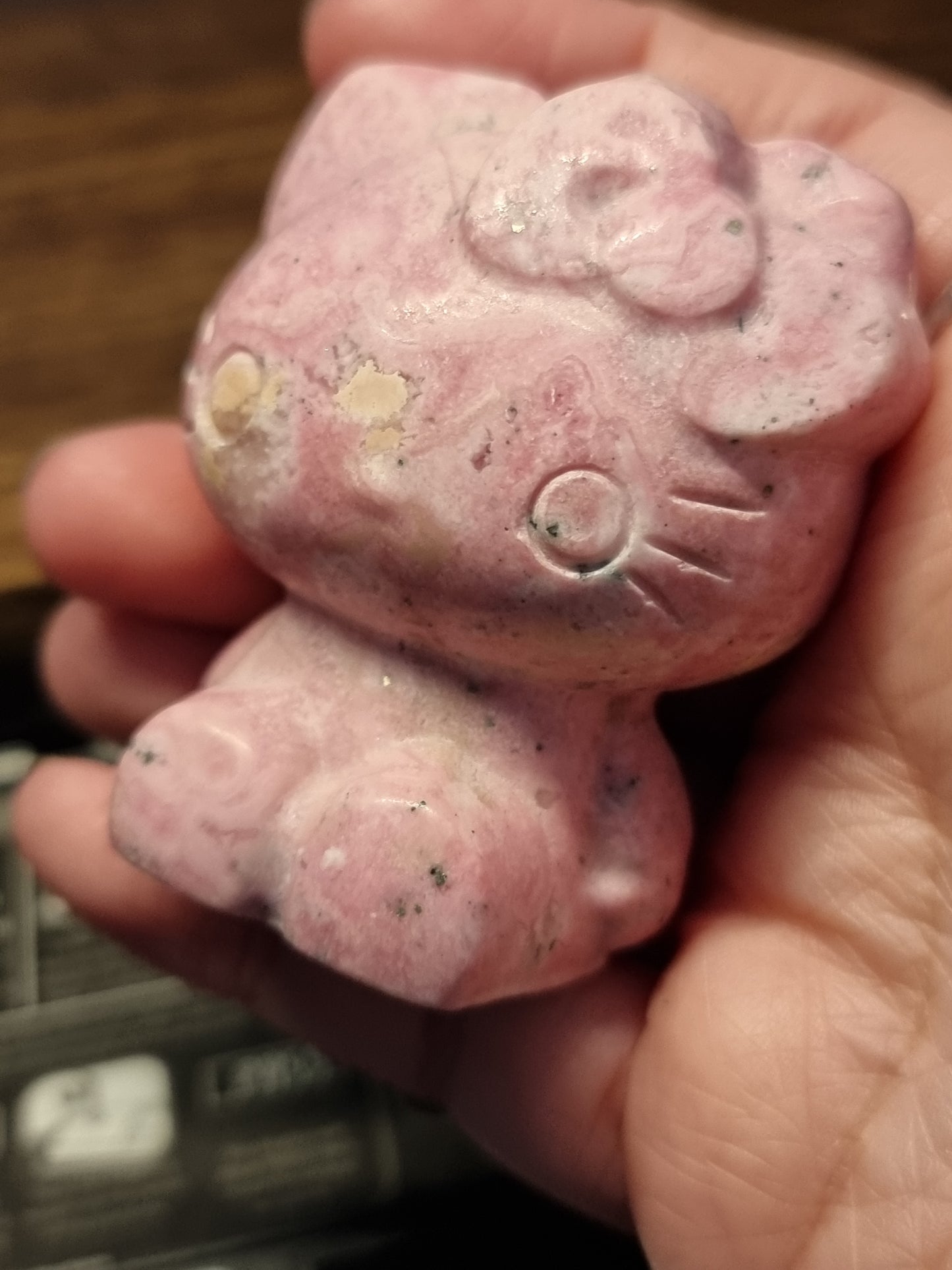 Peruvian rhodonite hello kitty carving