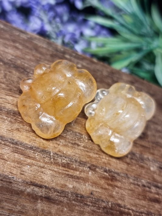 Golden healer bee carvings