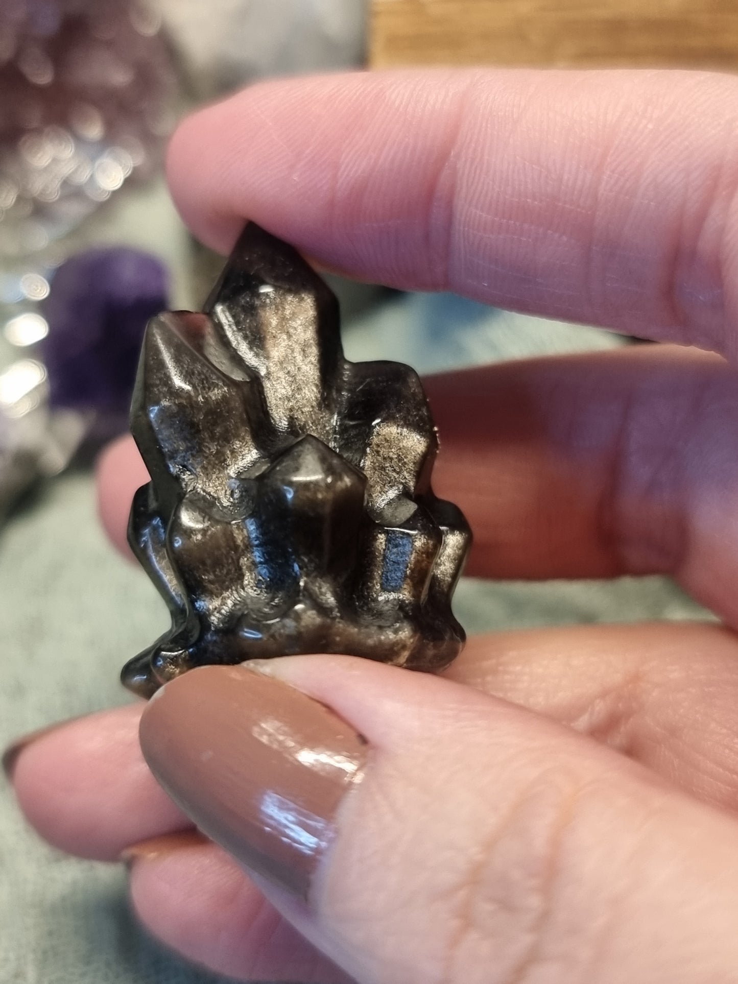 Silver obsidian crystal carving
