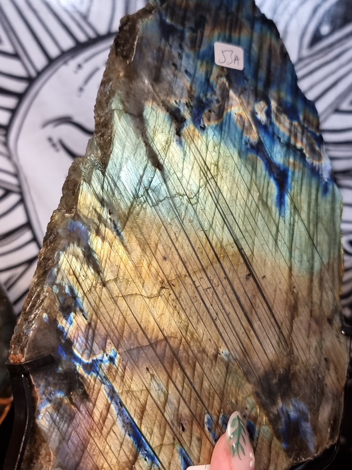 Labradorite slab on stand