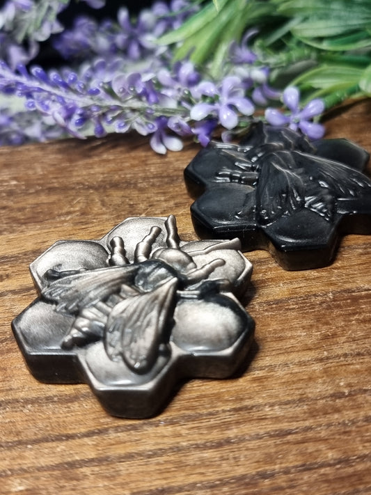 Silver obsidian bee carvings