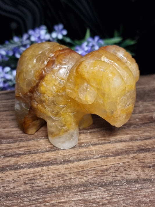 Golden healer sheep carving