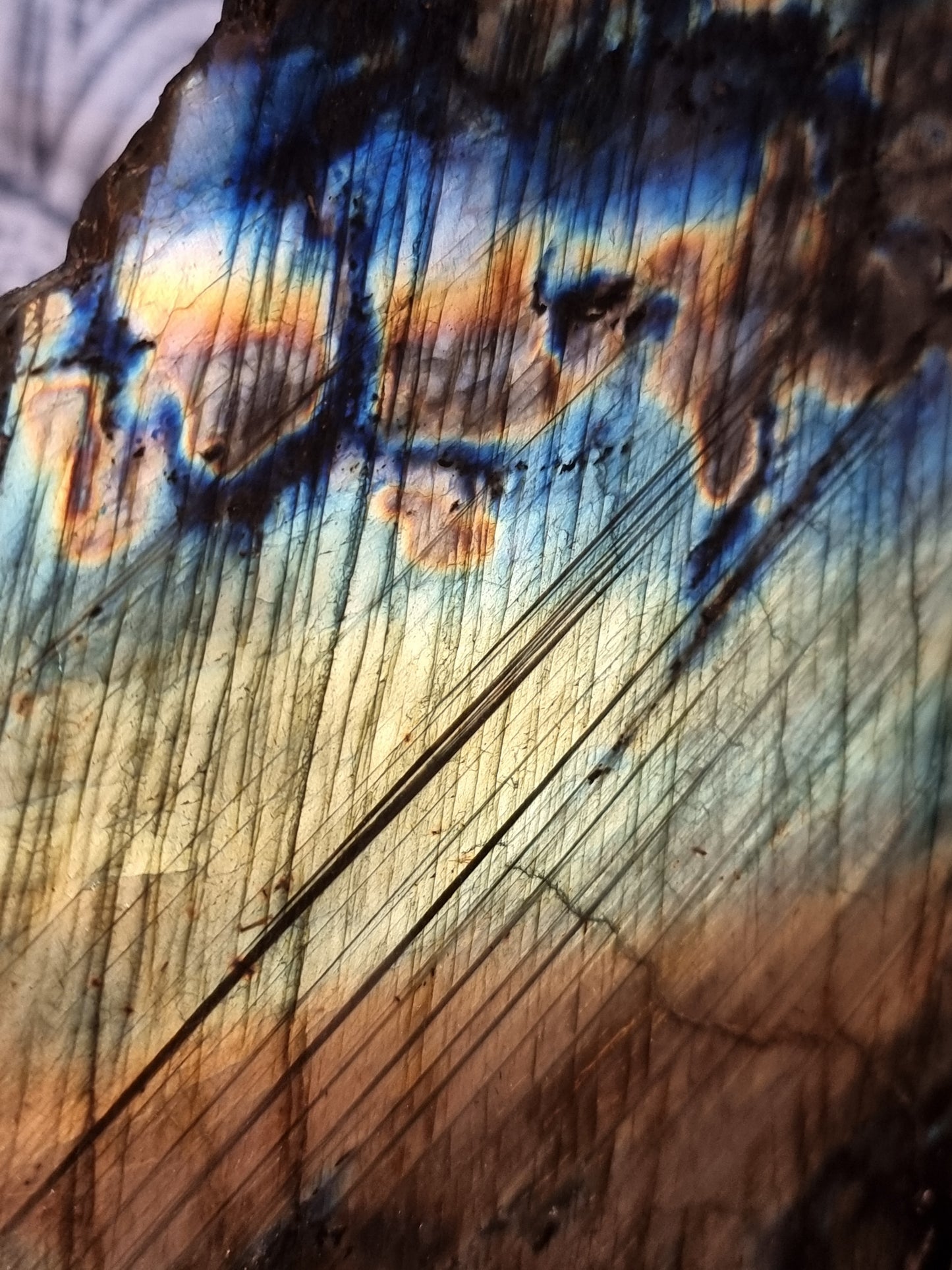 Labradorite slab on stand
