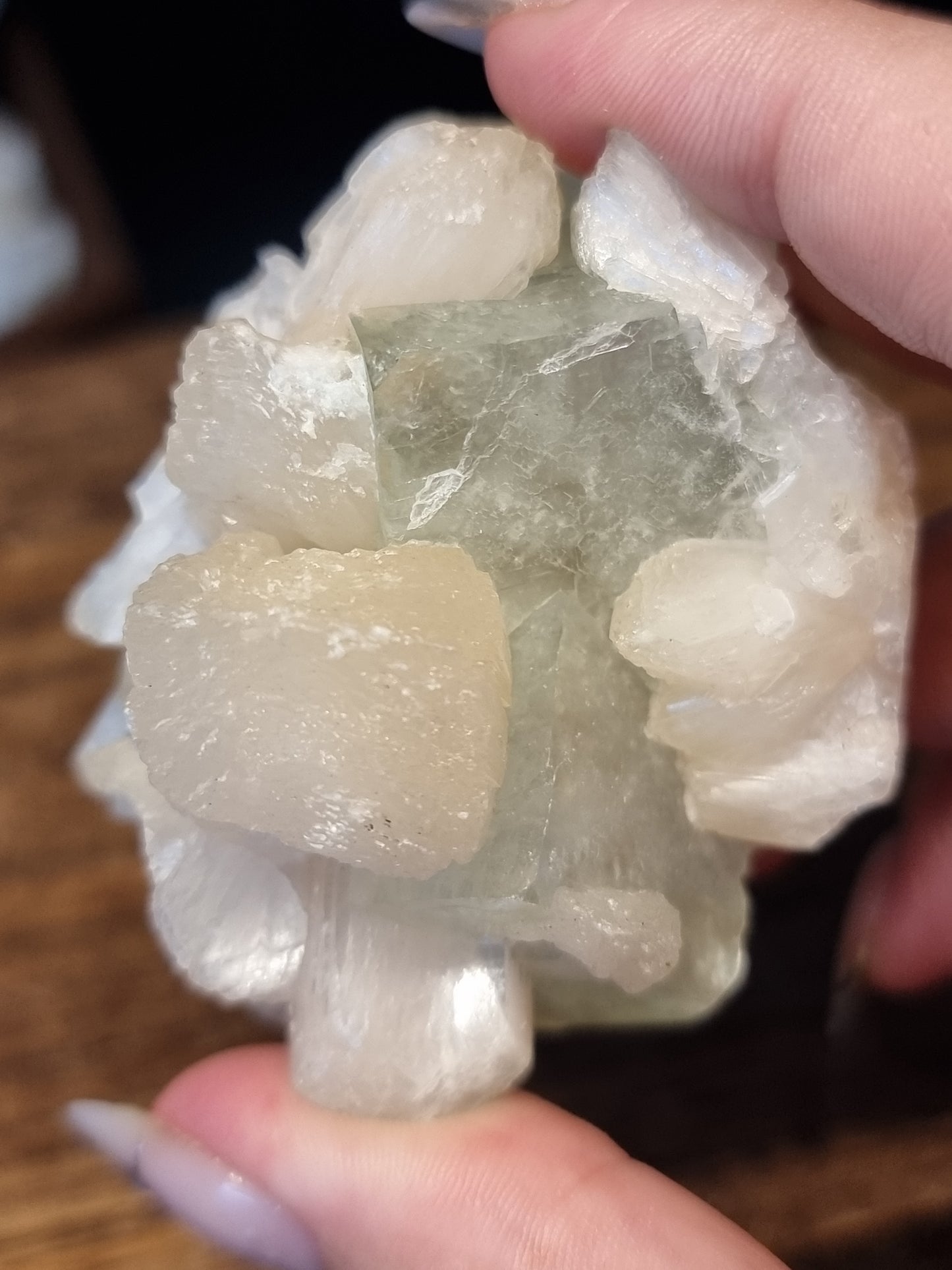 Gemmy green apophyllite with peach stilbite