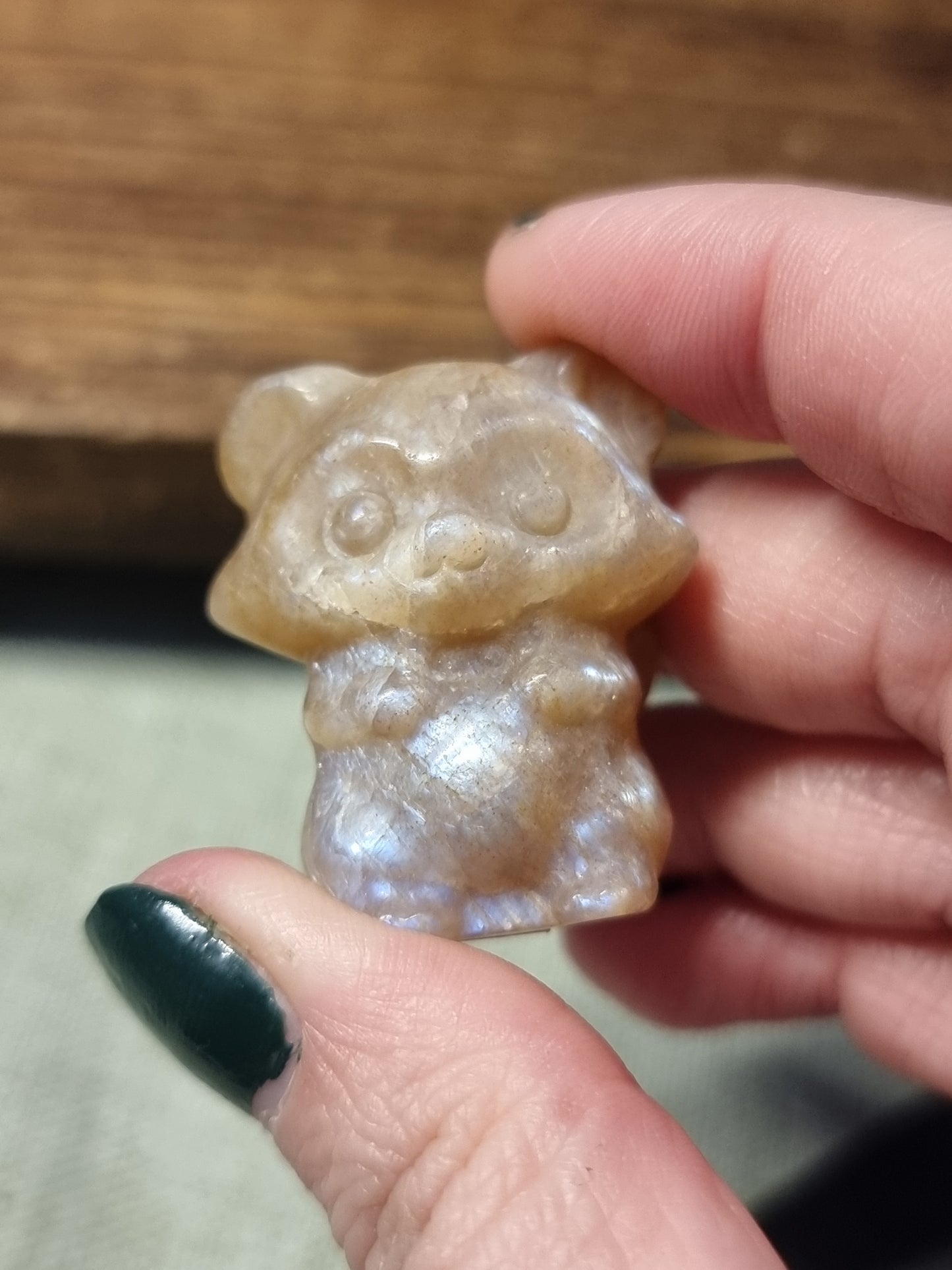 Moonstone raccoon carvings