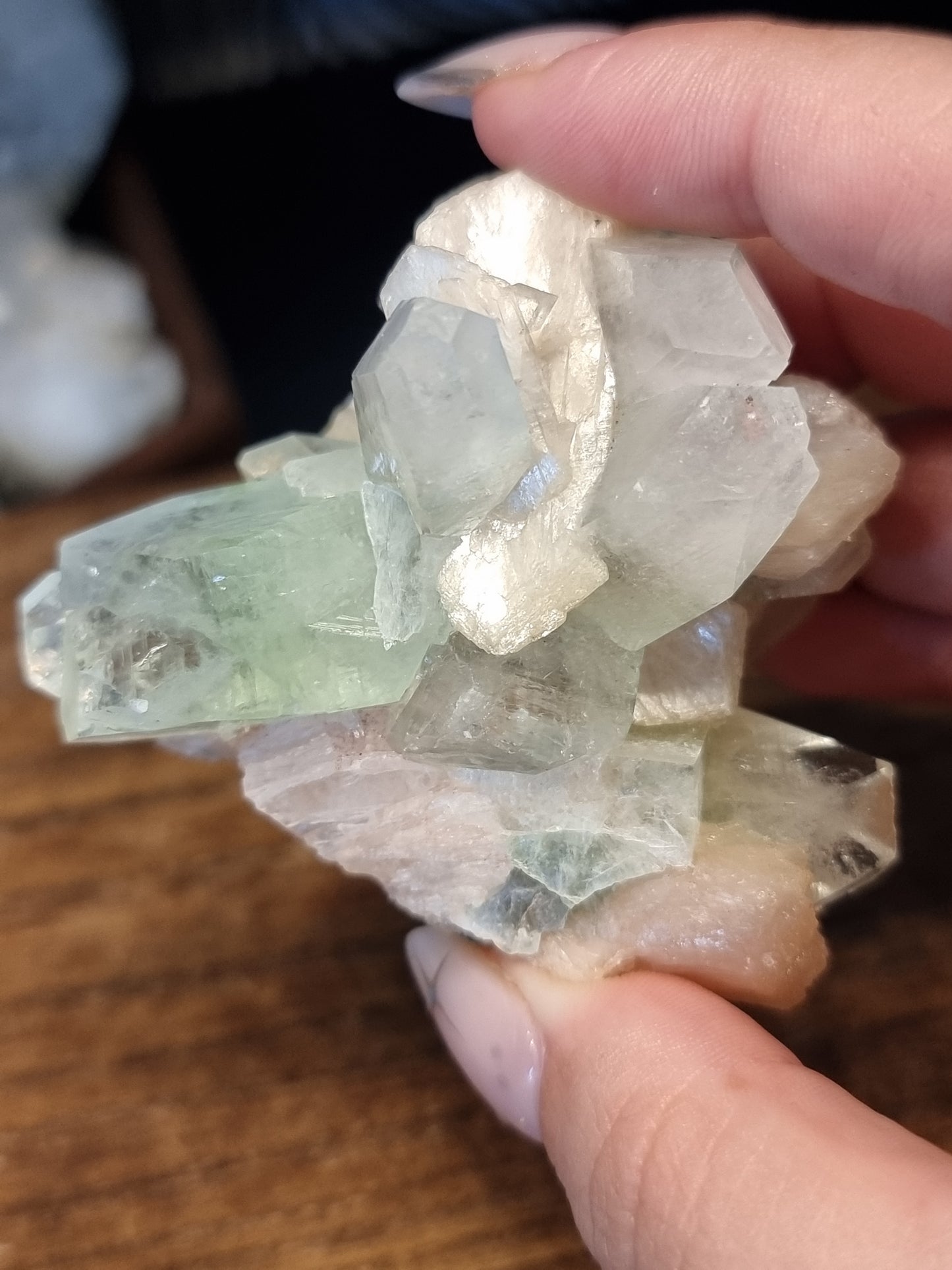 Gemmy green apophyllite with peach stilbite