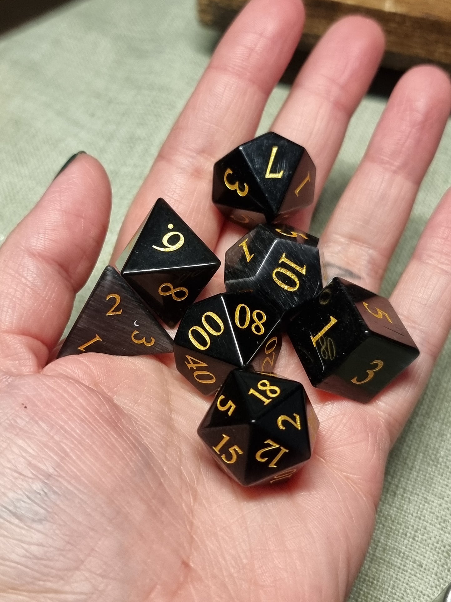 Black cat eye polyhedral dice set