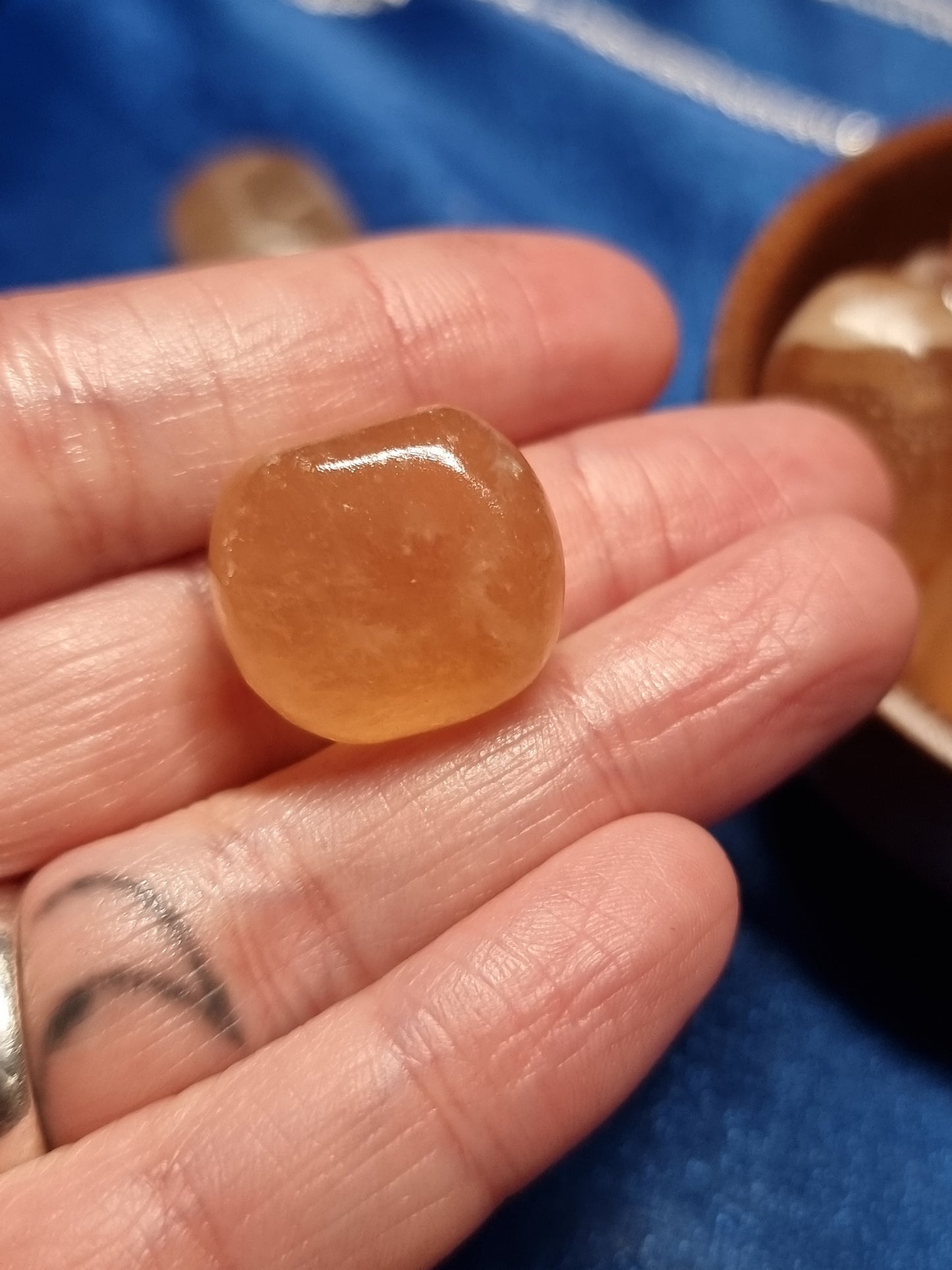 Honey calcite tumbles