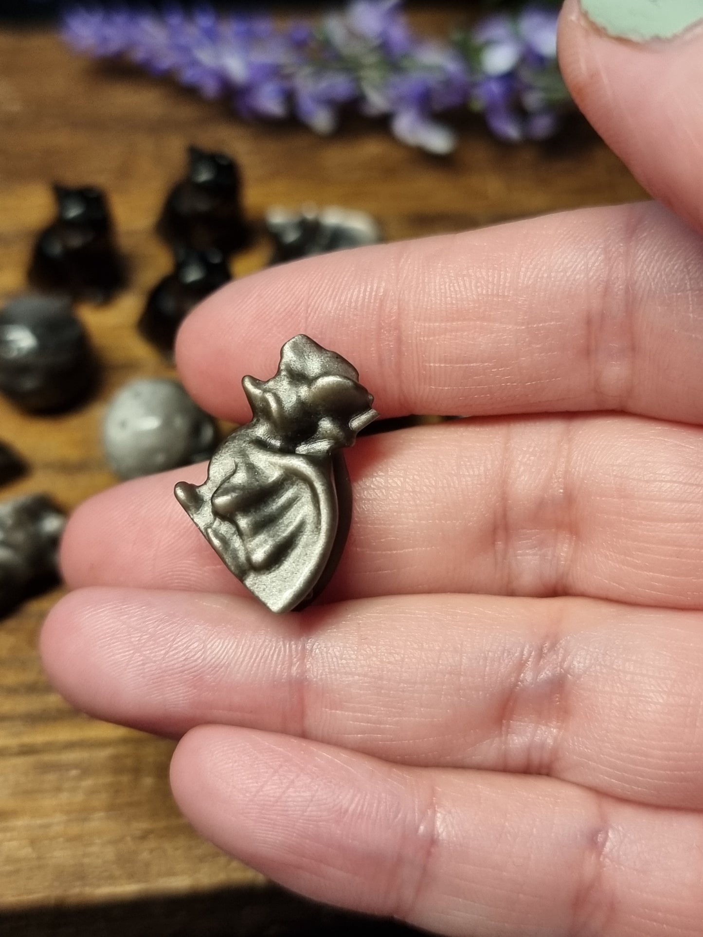 Mini silver obsidian carvings
