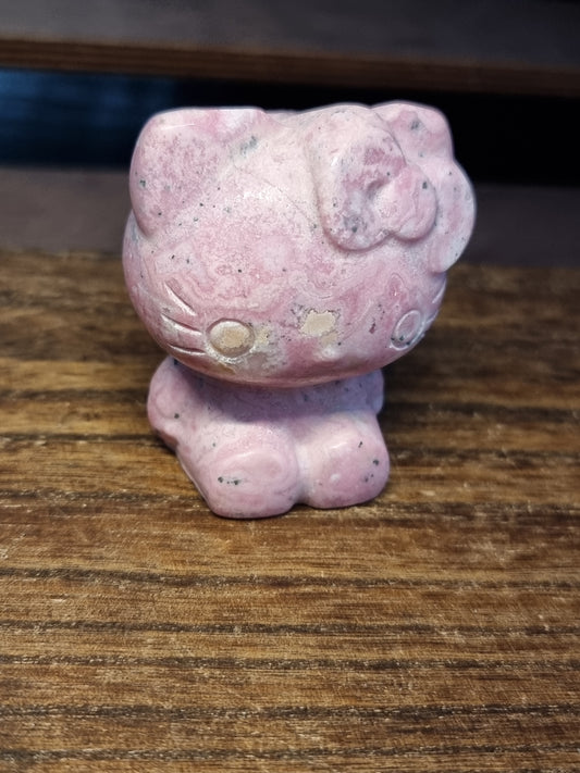 Peruvian rhodonite hello kitty carving