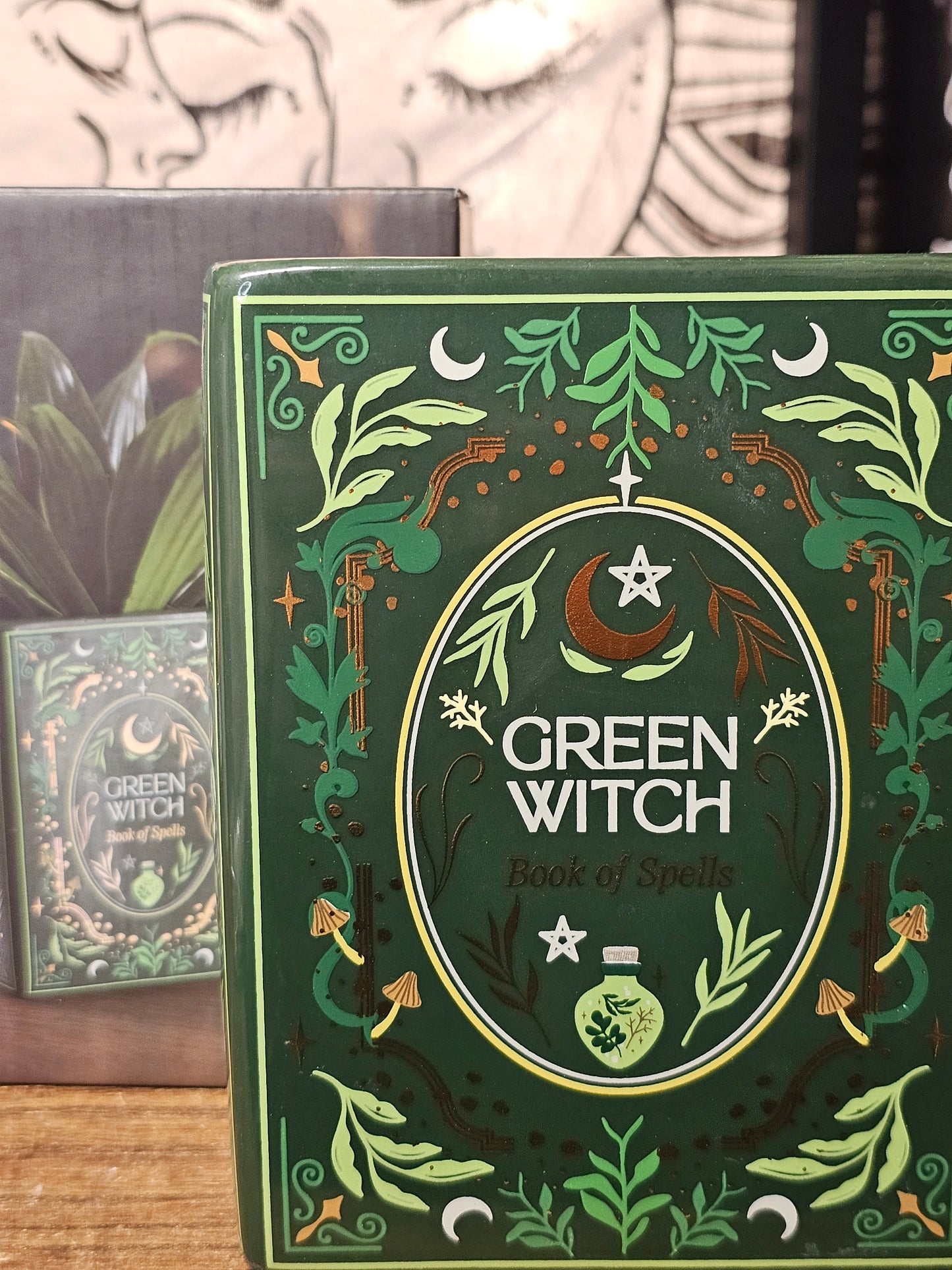 Green witch book vase