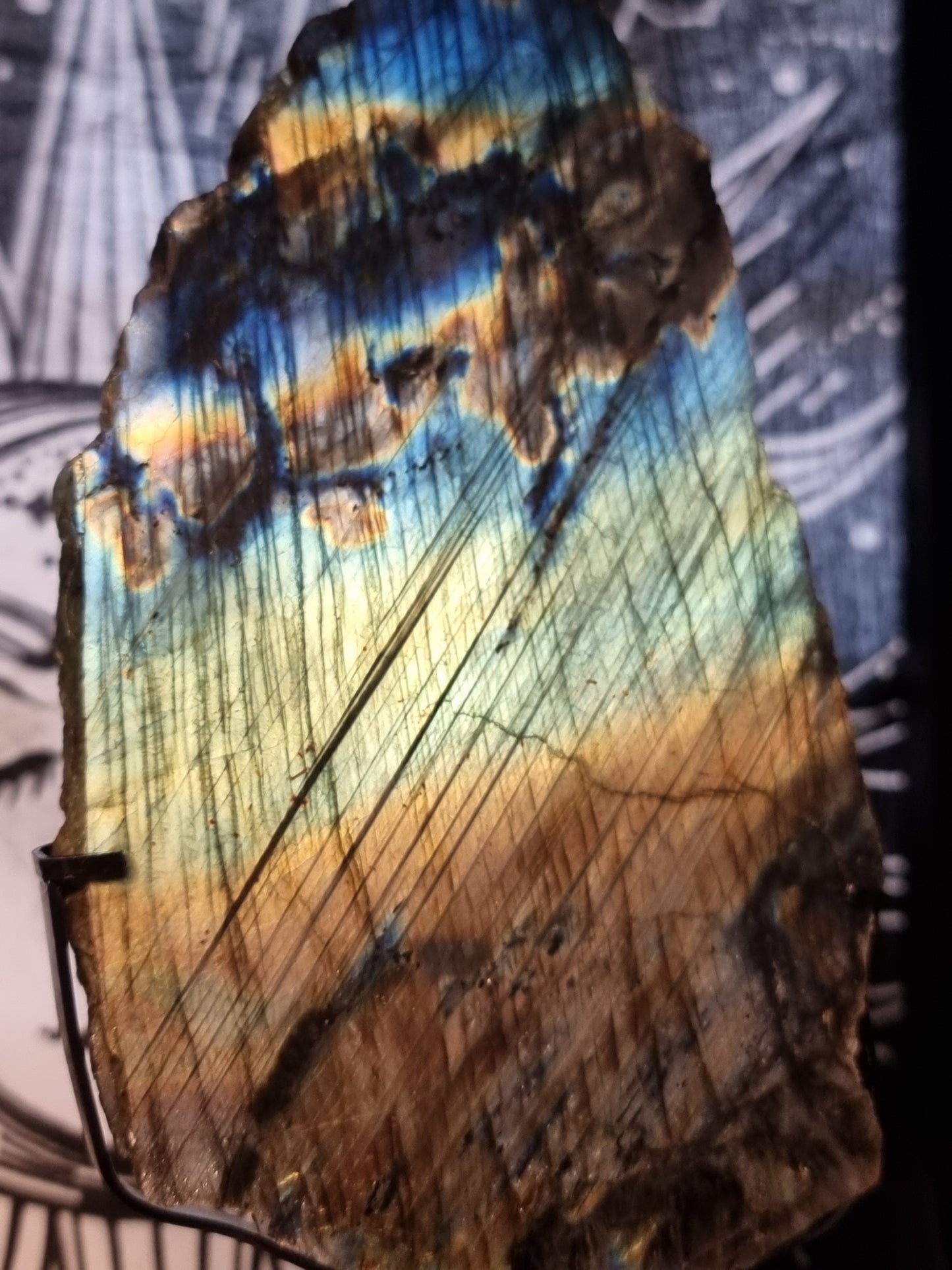 Labradorite slab on stand