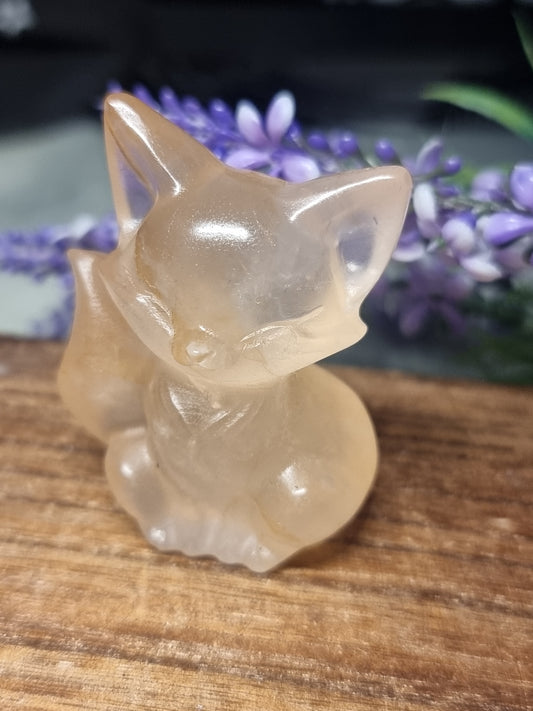 Rose quartz with golden healer fox