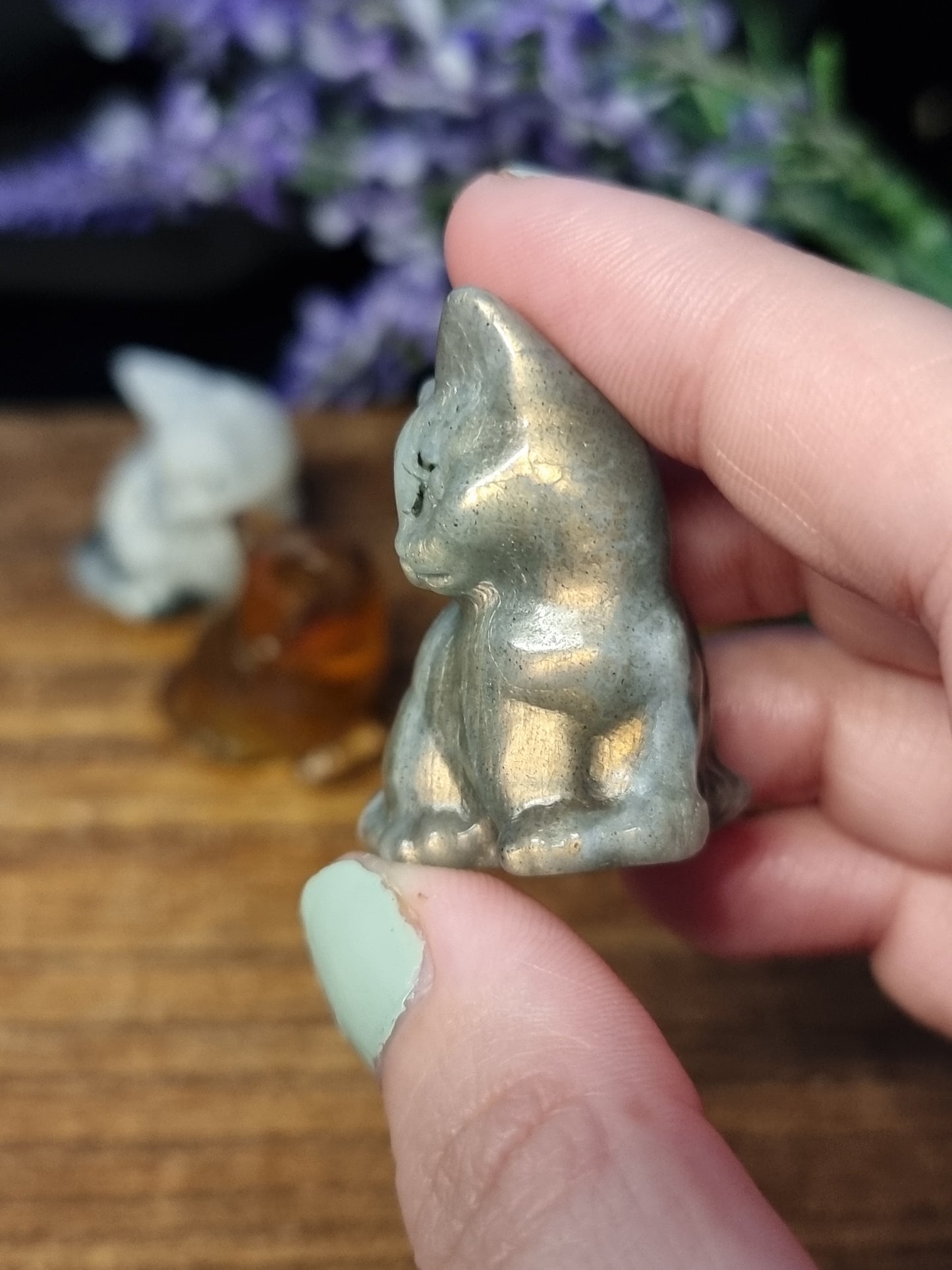 Sitting cat carvings