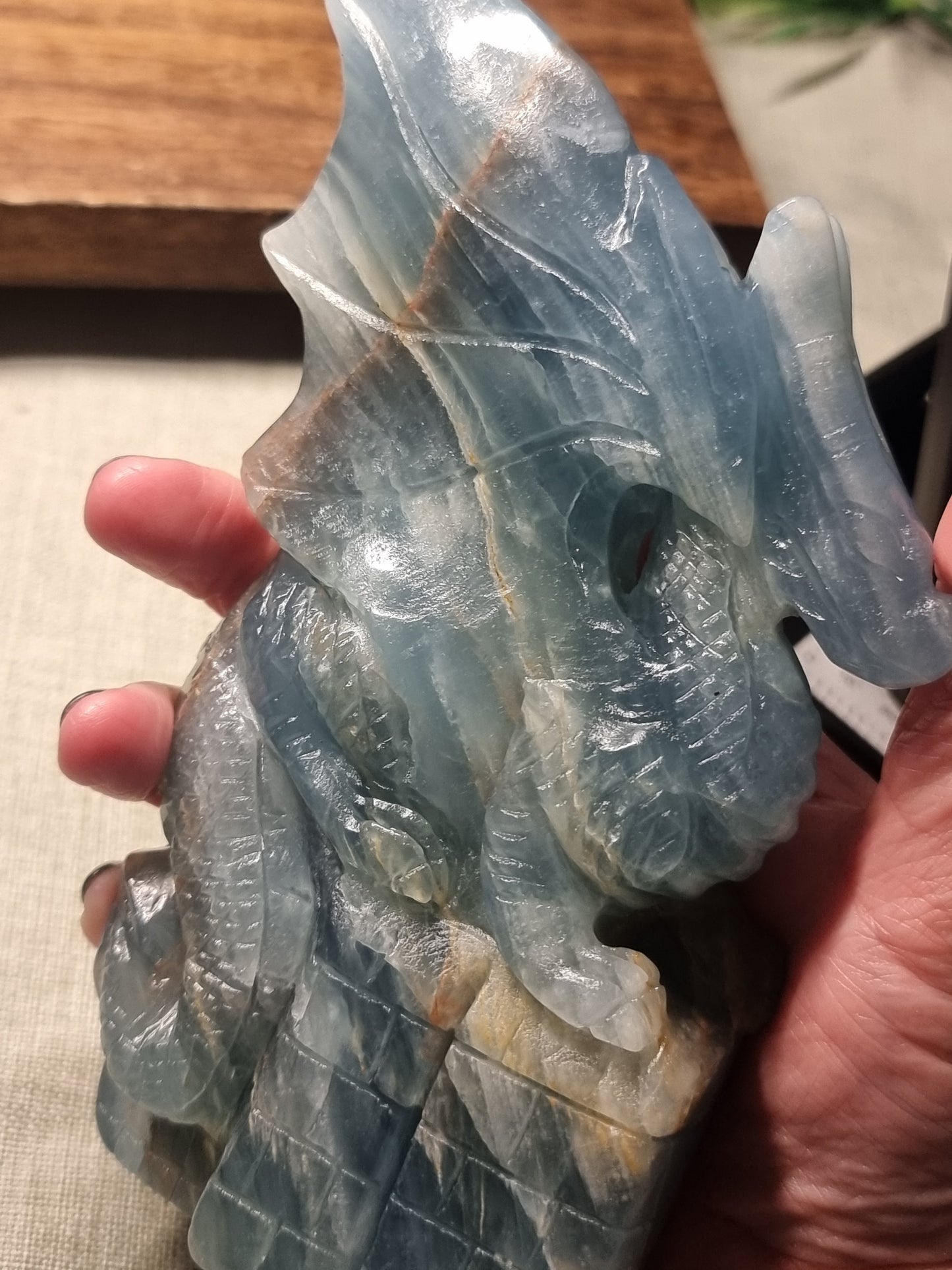 Hand carved blue aquatine calcite dragon