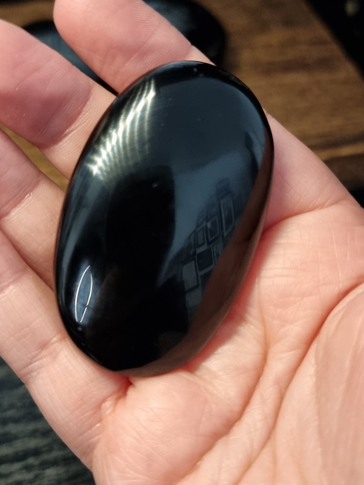 Obsidian palmstones