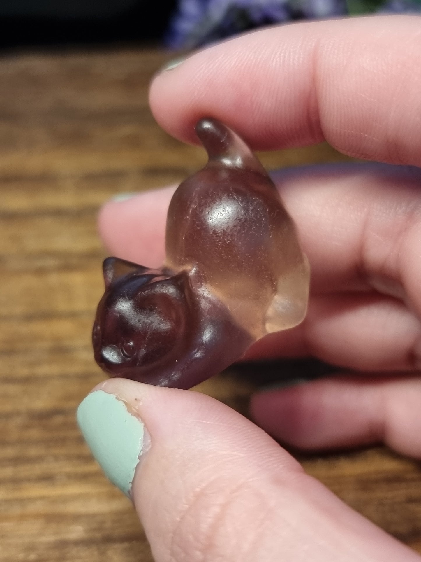 Fluorite playing cat carvings