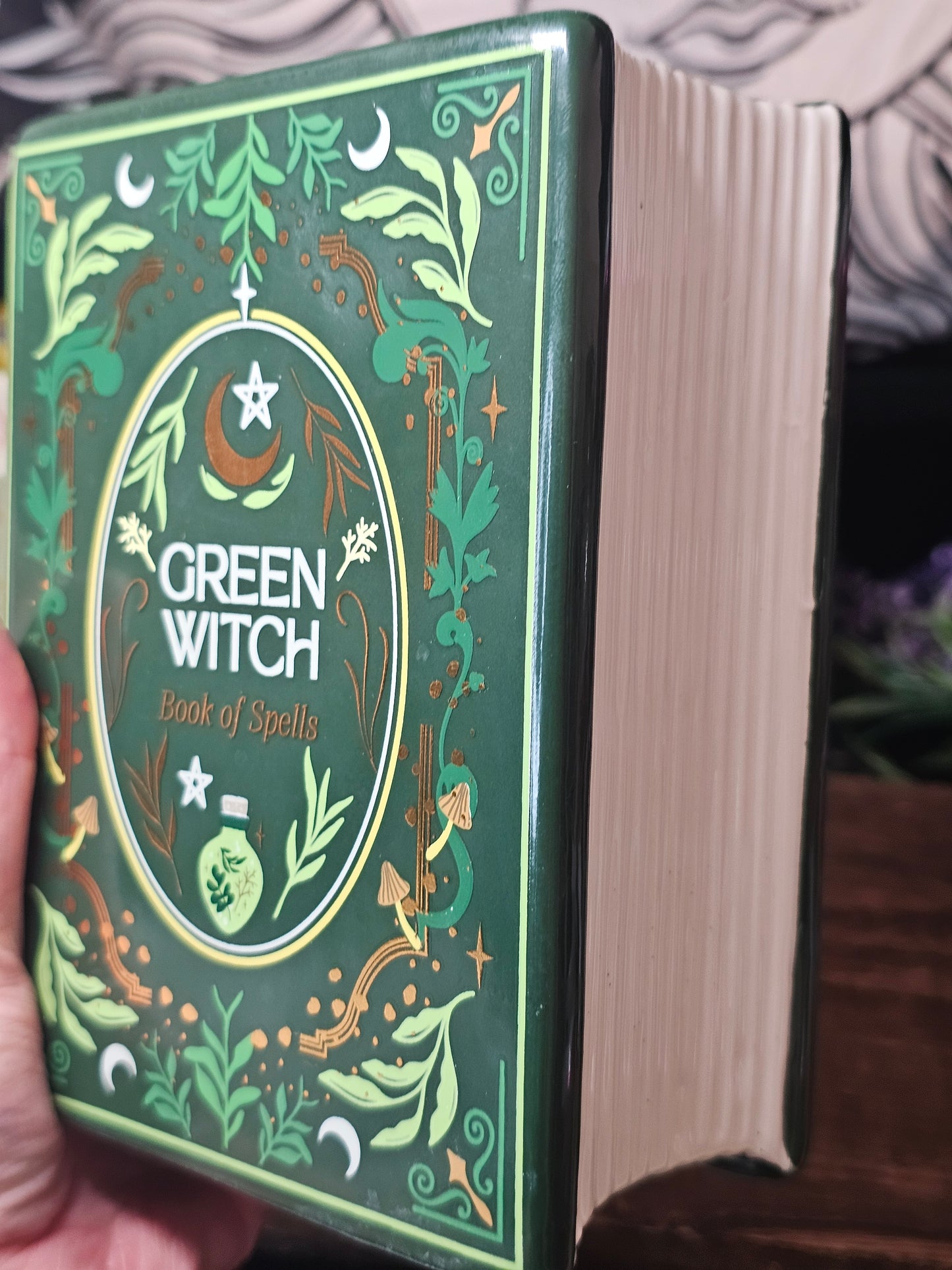 Green witch book vase