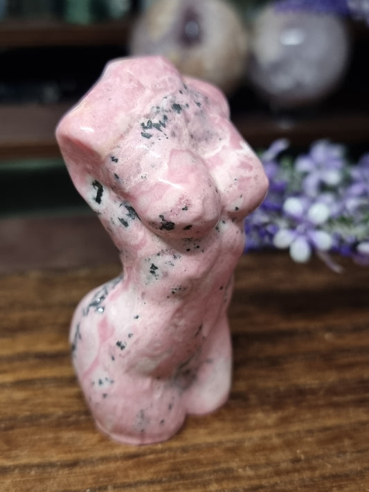 Peruvian rhodonite body carving