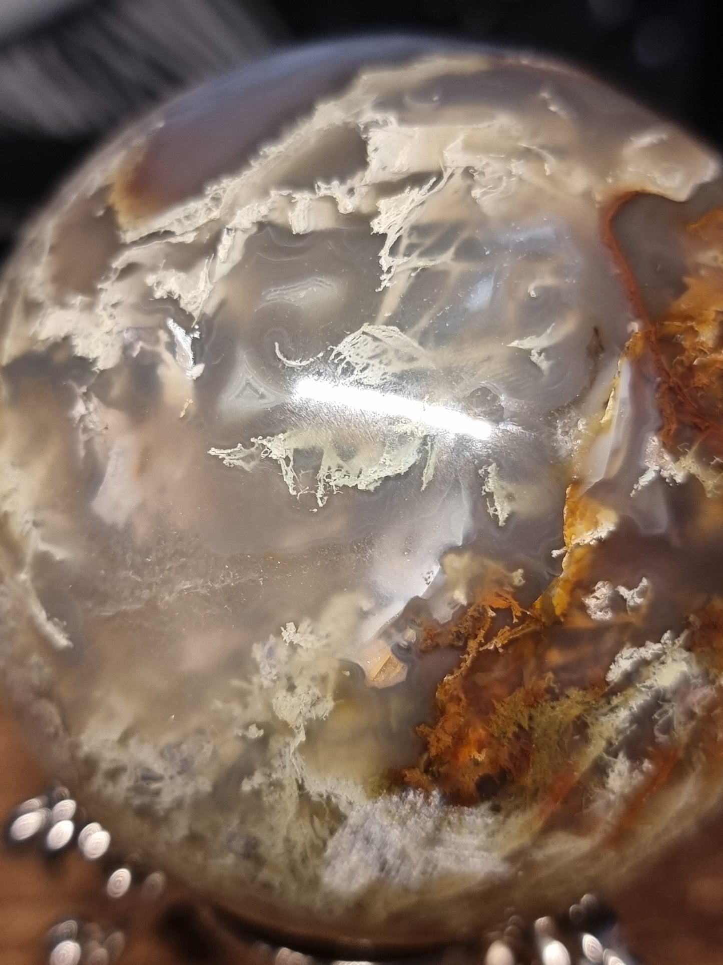 Colourful Moss agate sphere with small orca agate inclusions