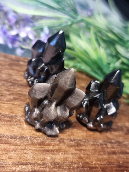 Silver obsidian crystal carving