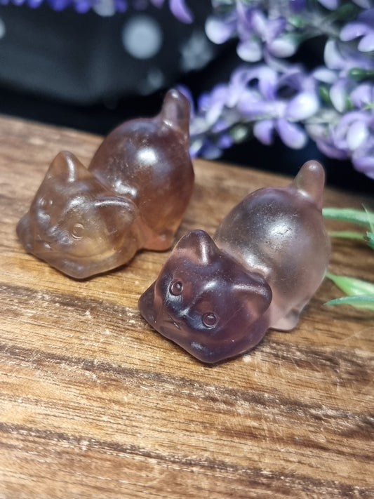 Fluorite playing cat carvings
