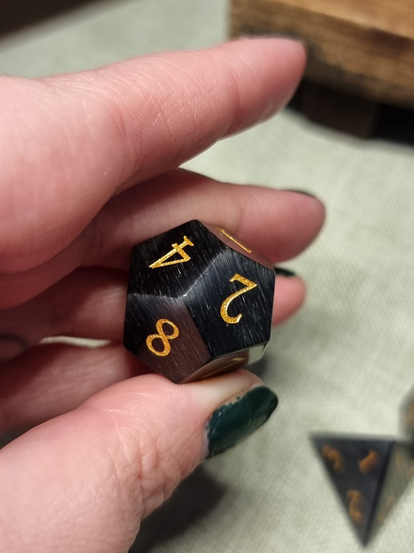 Black cat eye polyhedral dice set