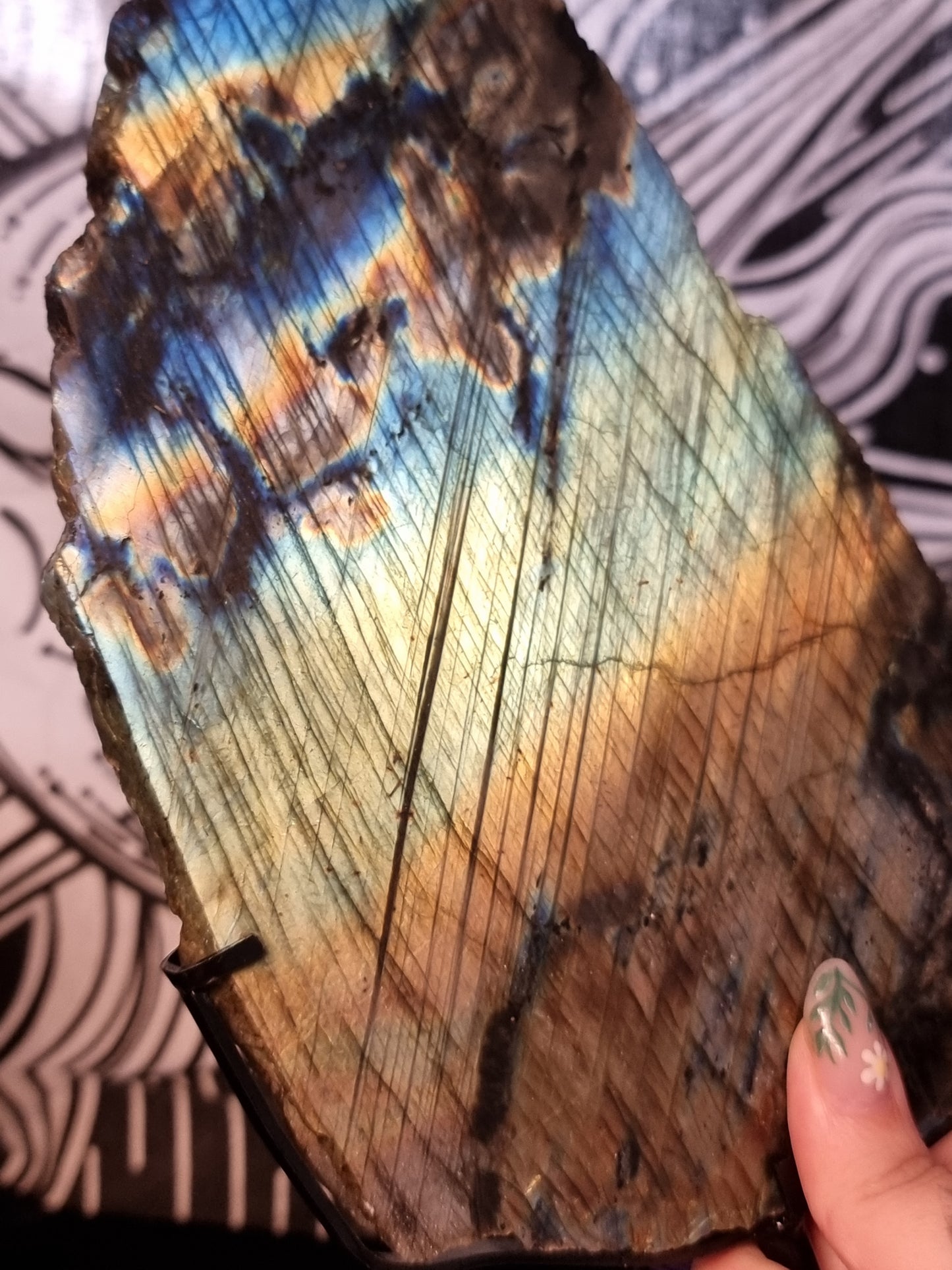 Labradorite slab on stand
