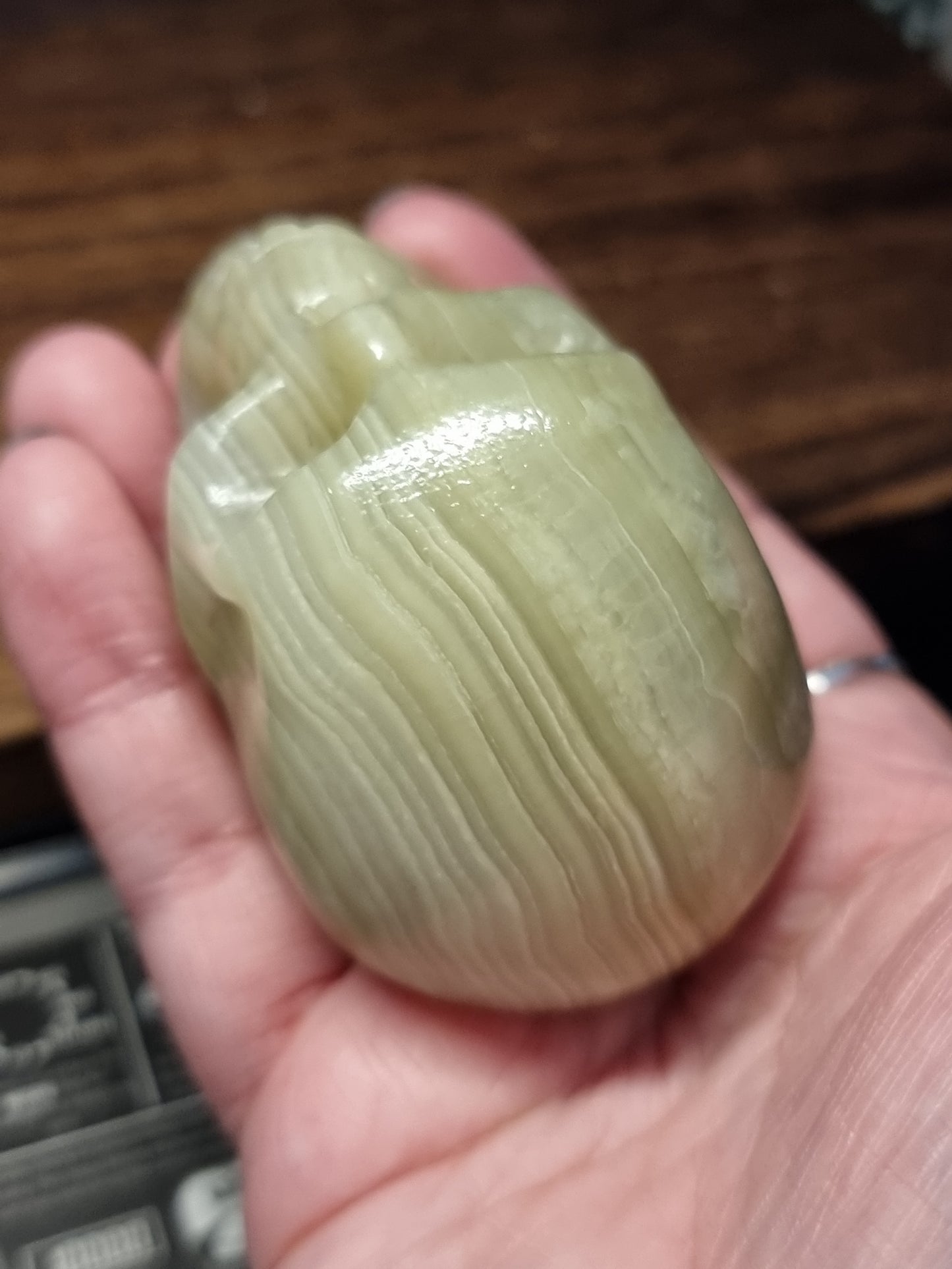 Green banded calcite skull