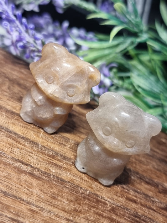 Moonstone raccoon carvings
