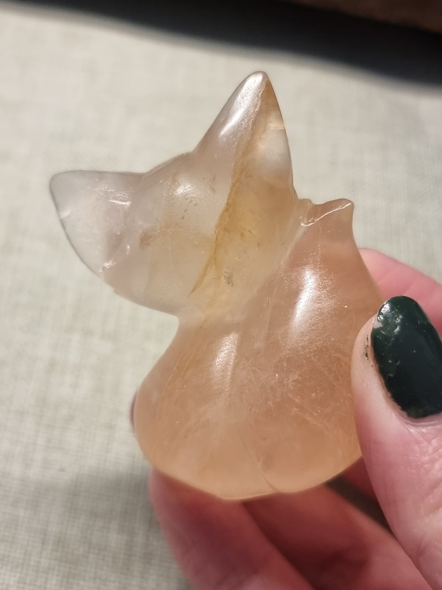 Rose quartz with golden healer fox