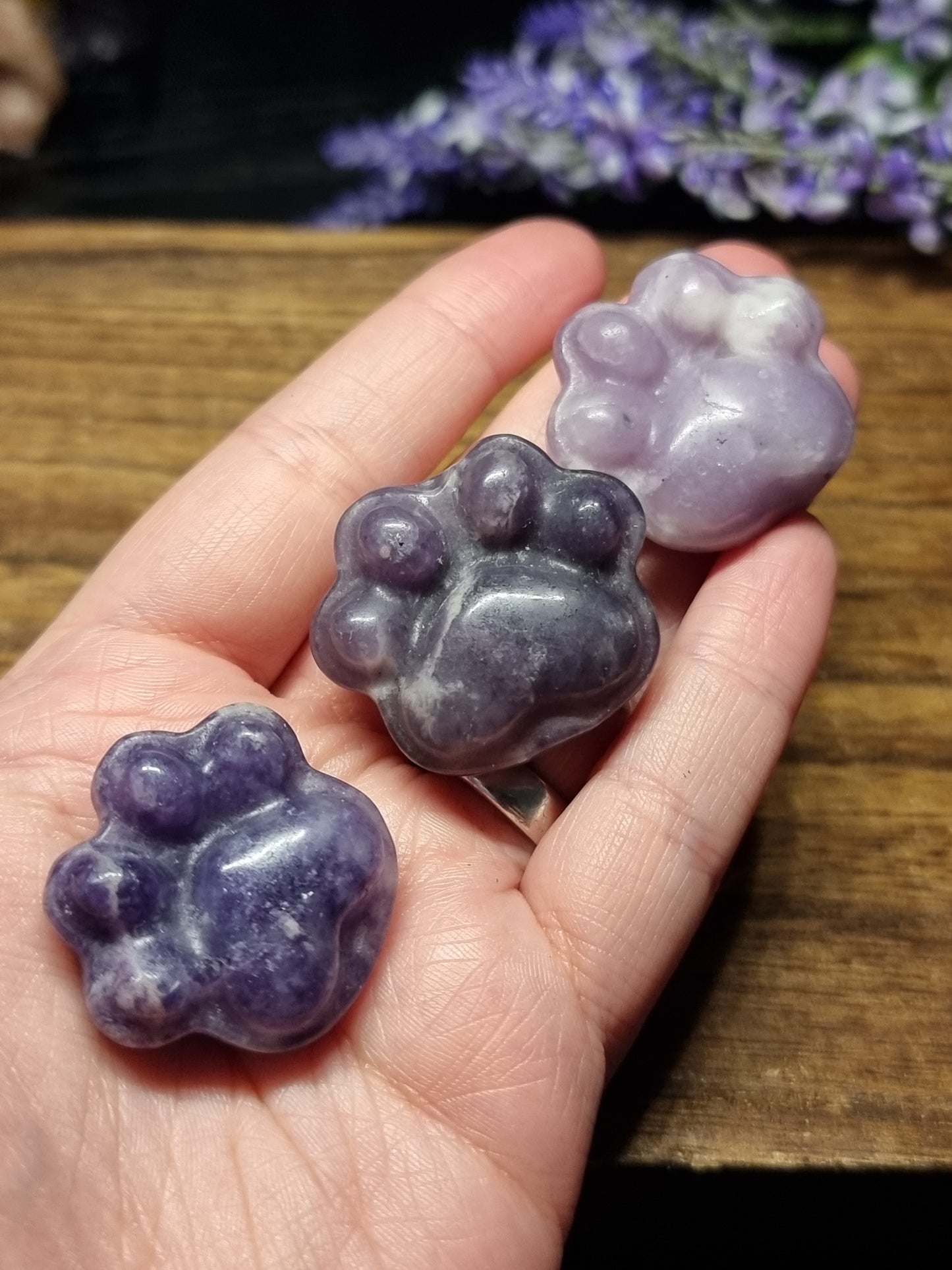 Lepidolite paw carvings