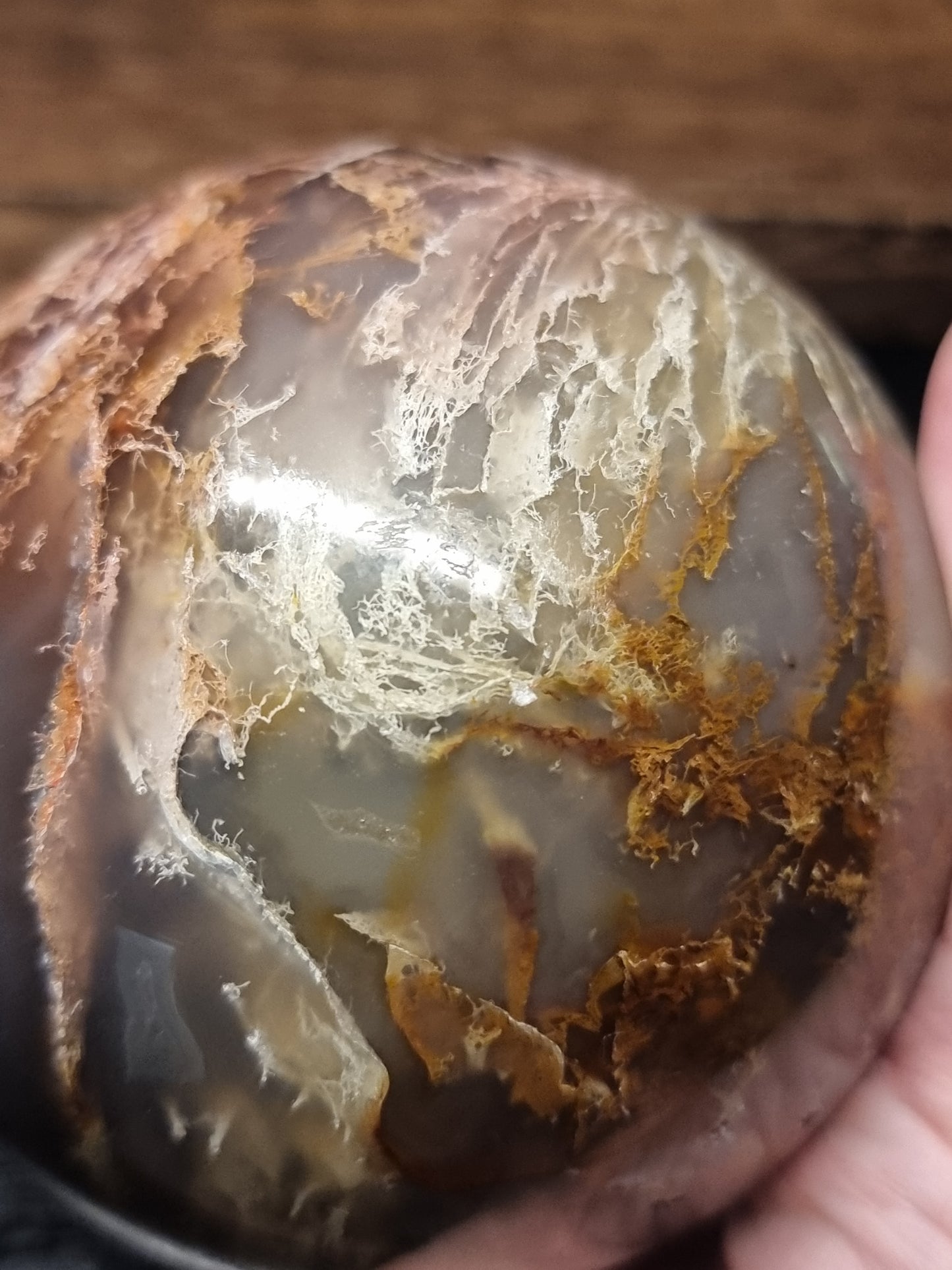 Colourful Moss agate sphere with small orca agate inclusions
