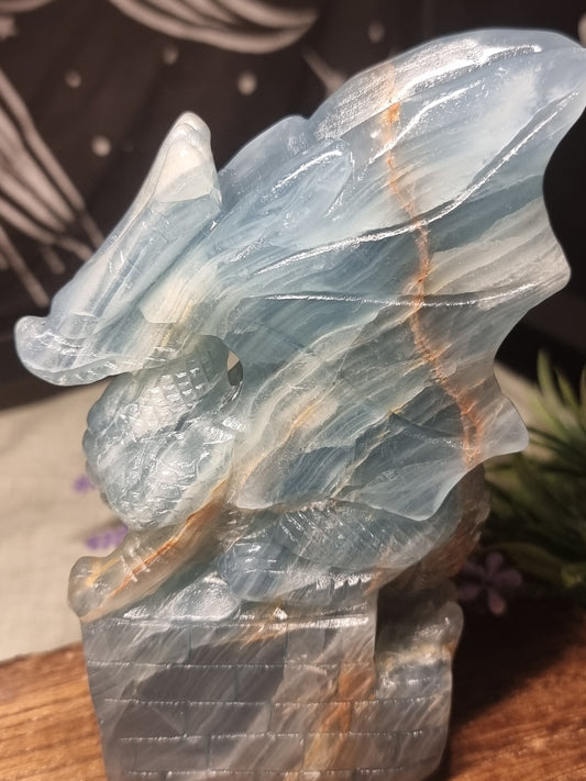 Hand carved blue aquatine calcite dragon