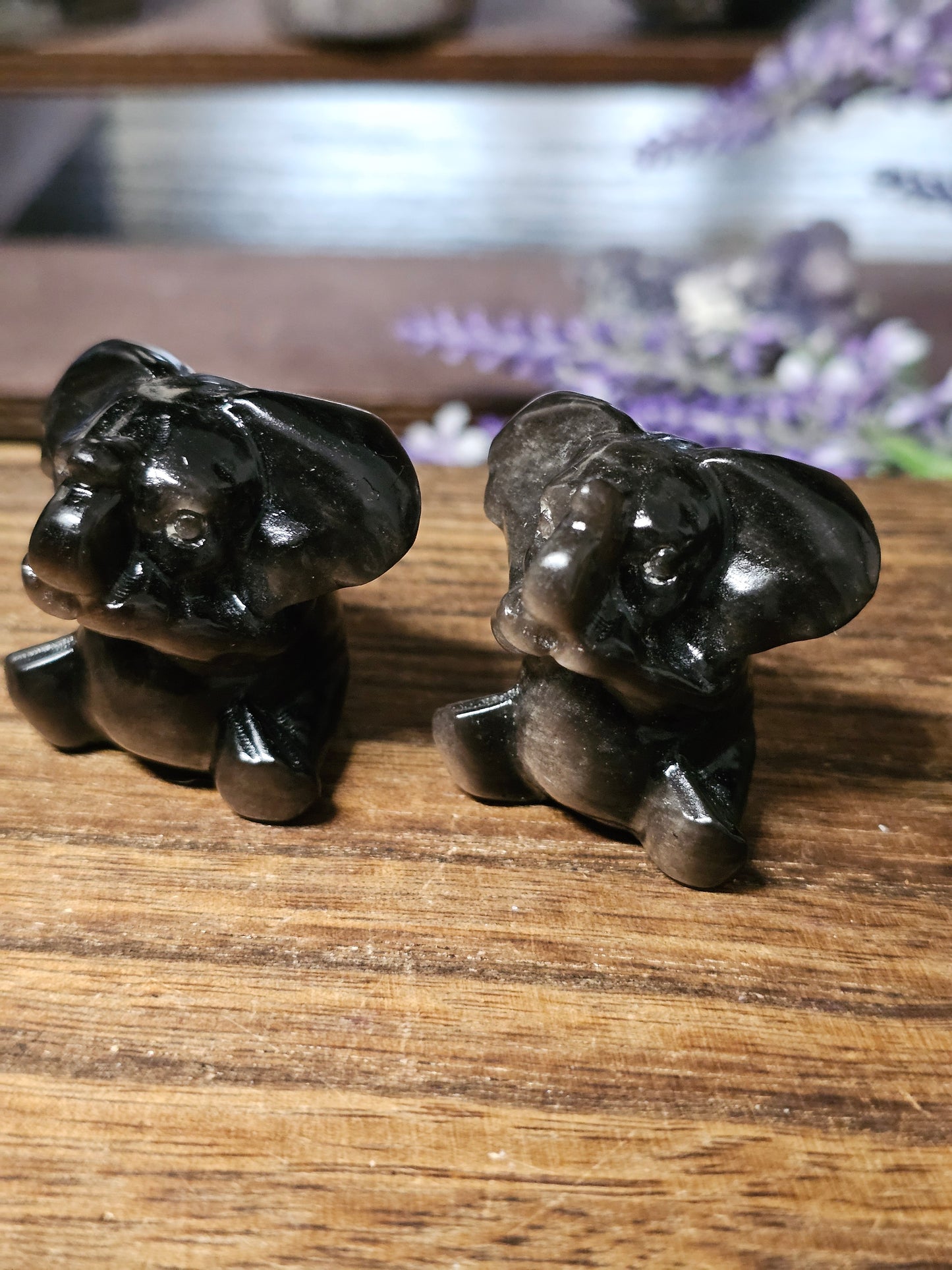 Silver obsidian elephants