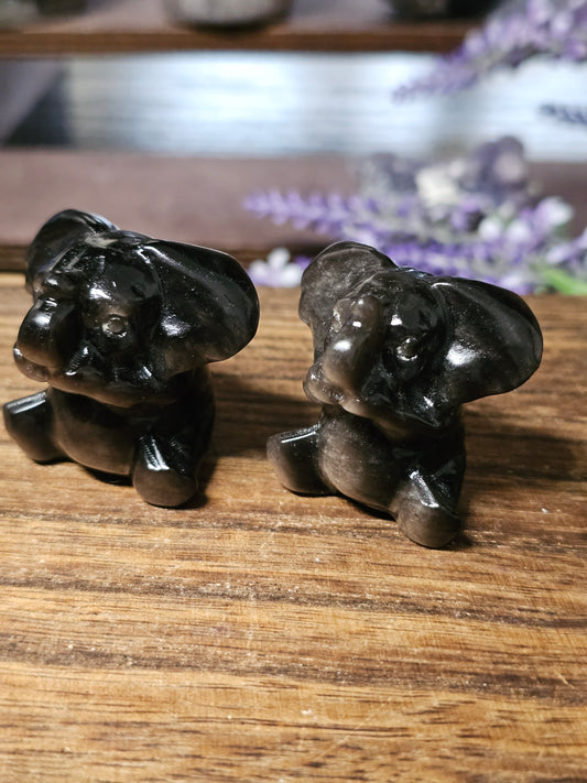Silver obsidian elephants