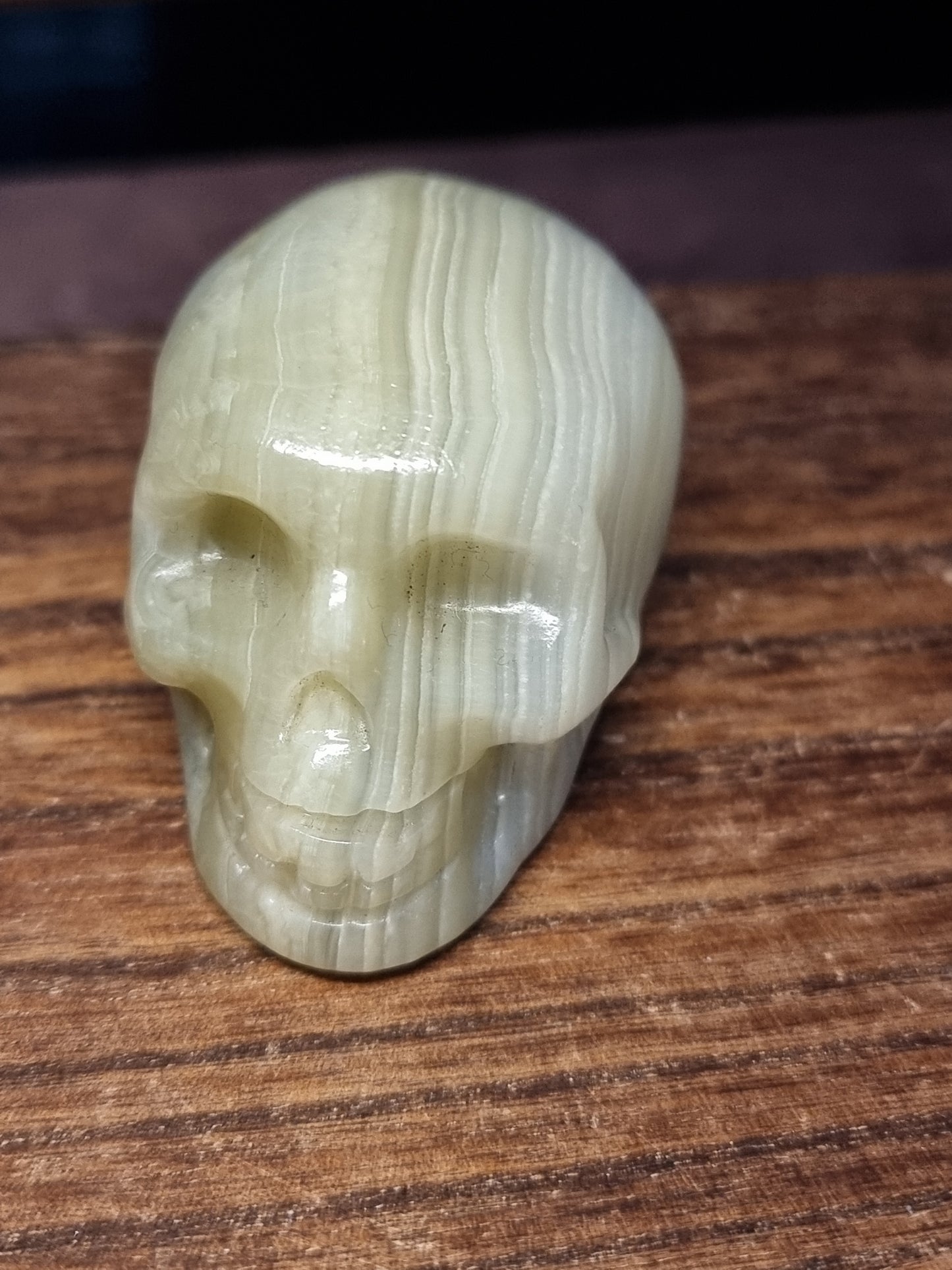 Green banded calcite skull