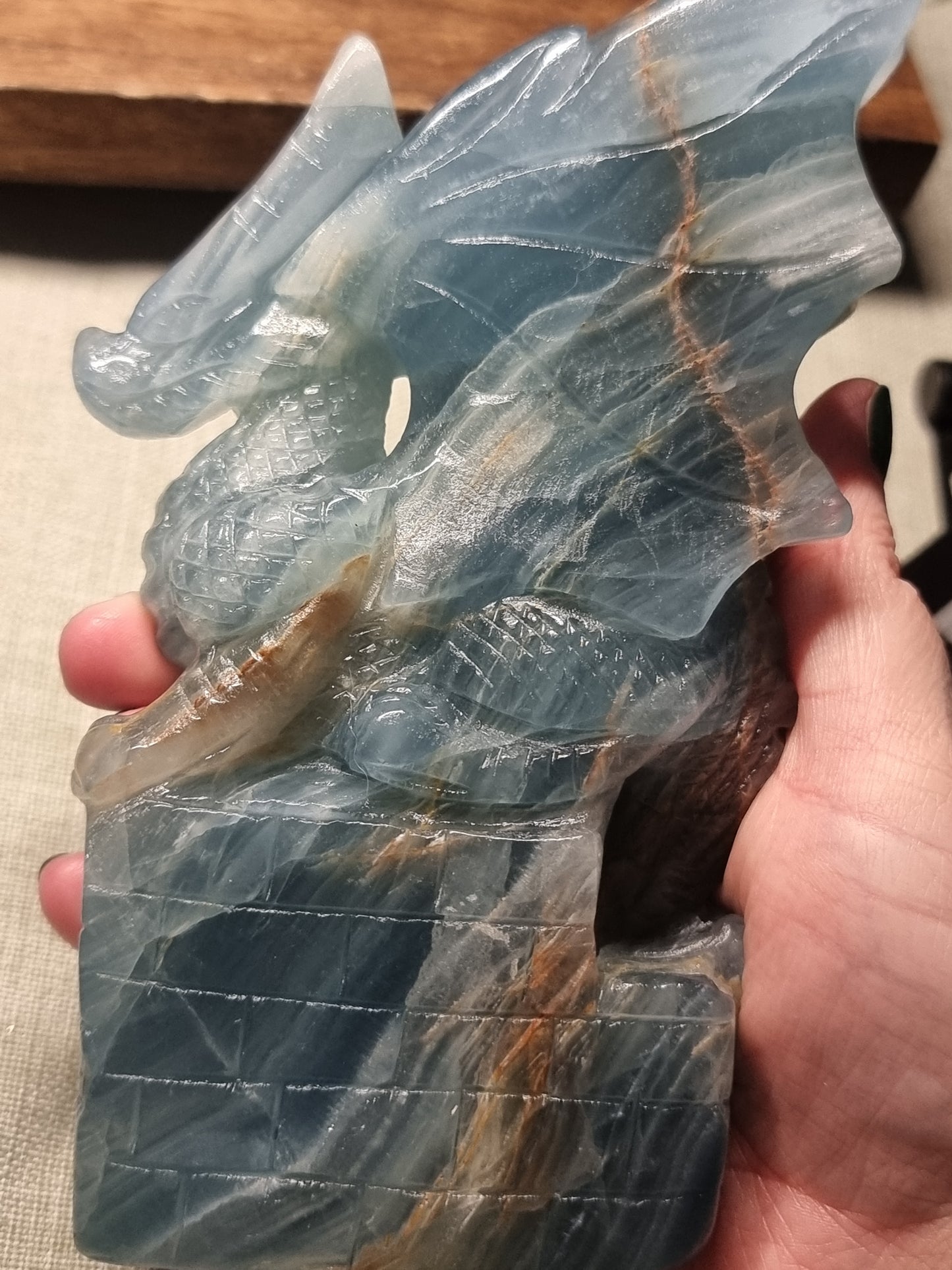 Hand carved blue aquatine calcite dragon