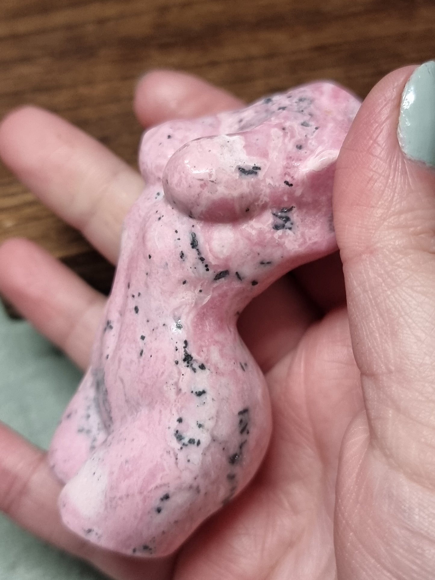Peruvian rhodonite body carving
